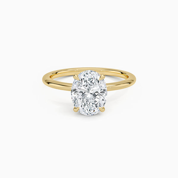 Carré de Luxe Collection D-E VS+ Oval Diamond Prong Ring