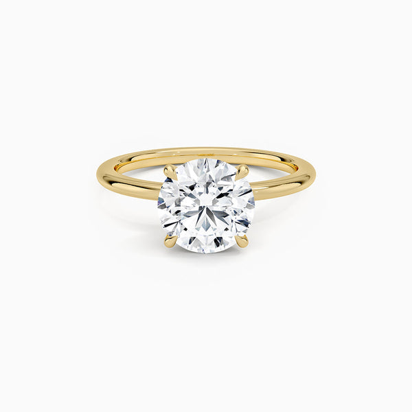 Carré de Luxe Collection D-E VS+ Round Diamond Prong Ring